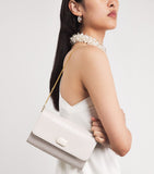 Jeffrey Levinson leather croc-embossed clutch bag, UK version