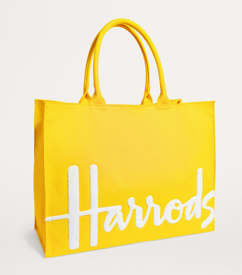 Harrods large cotton logo tote bag in vibrant yellow, UK version