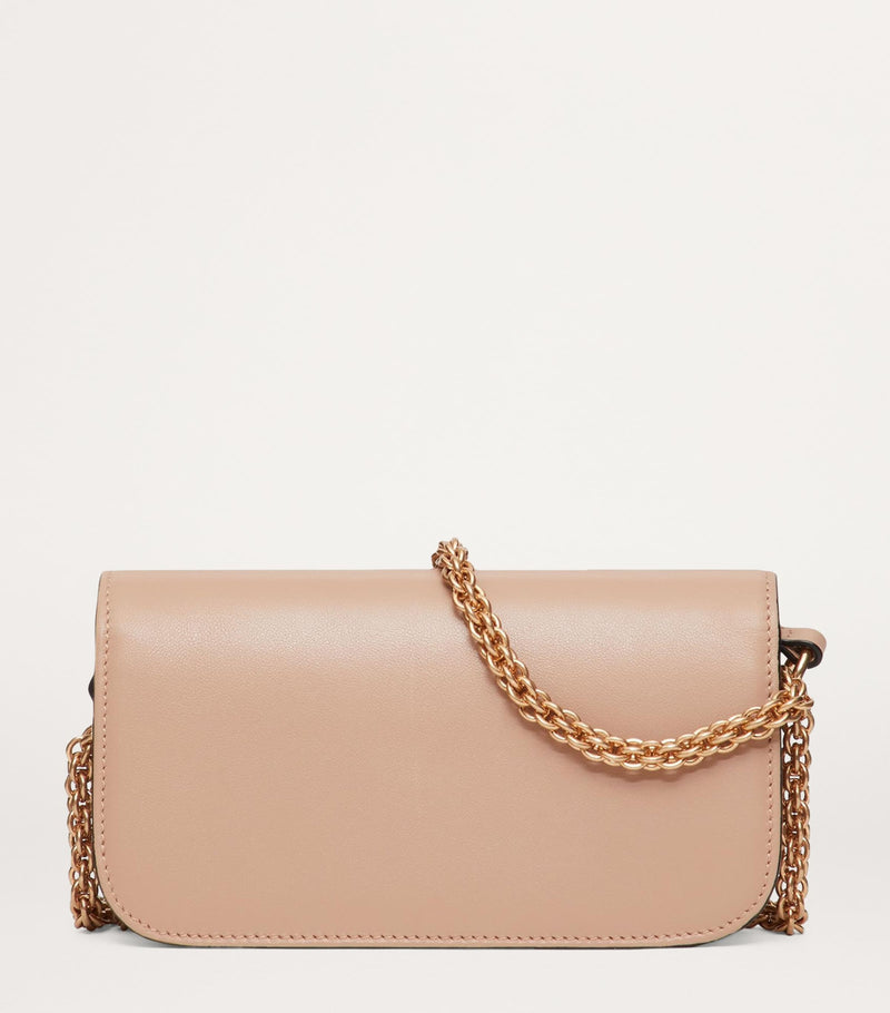 Valentino Garavani Small Leather Locò shoulder bag, imported from the UK