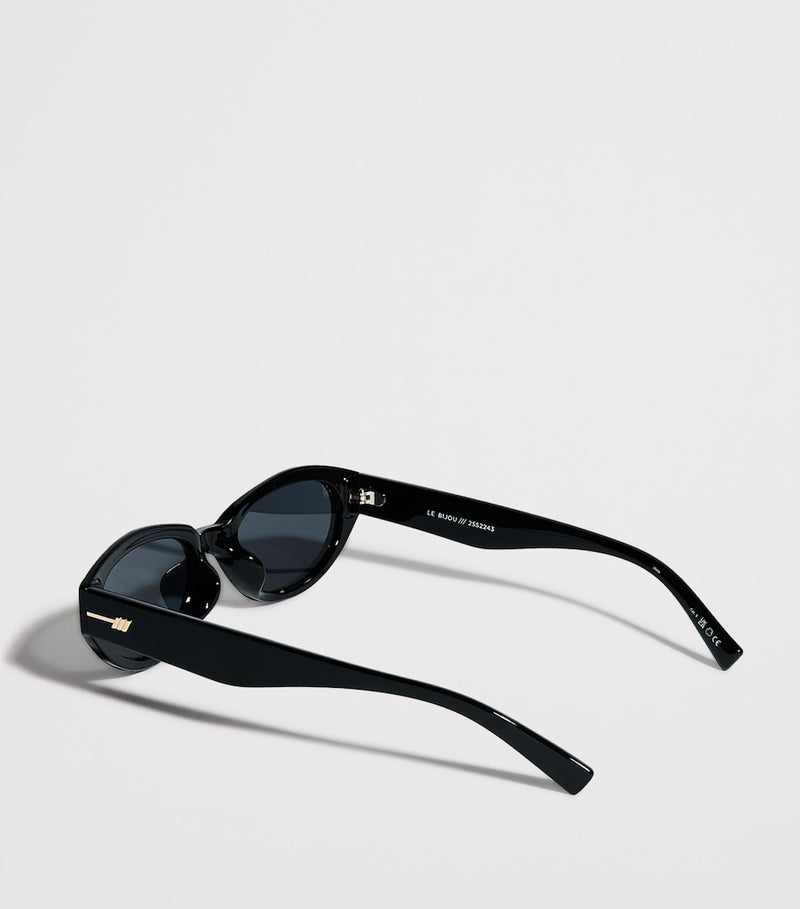 Le Specs Le Bijou oval sunglasses with gold-tone detailing, UK version