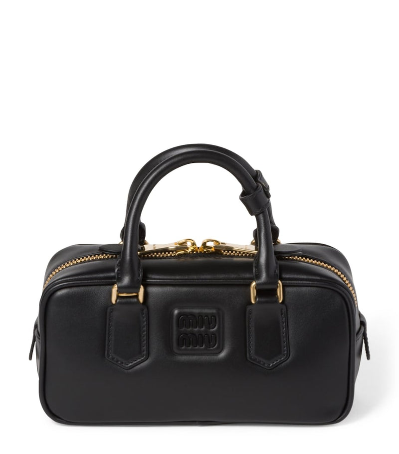 Miu Miu Arcadie top-handle bag in leather, imported from the UK