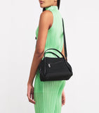 Pleats Please Issey Miyake mini bias pleats duffle bag, imported from the UK