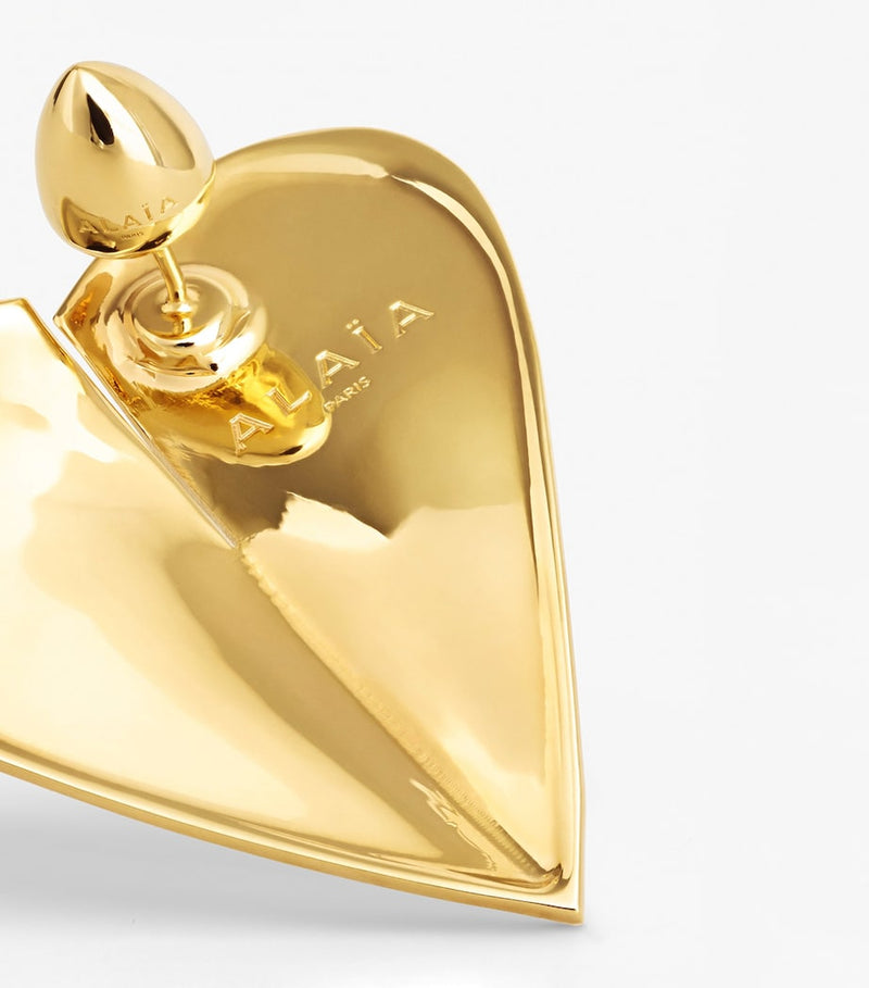 Alaïa Le Coeur stud earrings broken heart motif in brass (British brand)