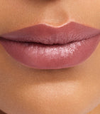 Carolina Herrera mini tinted lip balm with sheer finish (British brand)