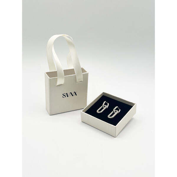SVNX ribbed oval hoop earrings in silver, imported from the UK