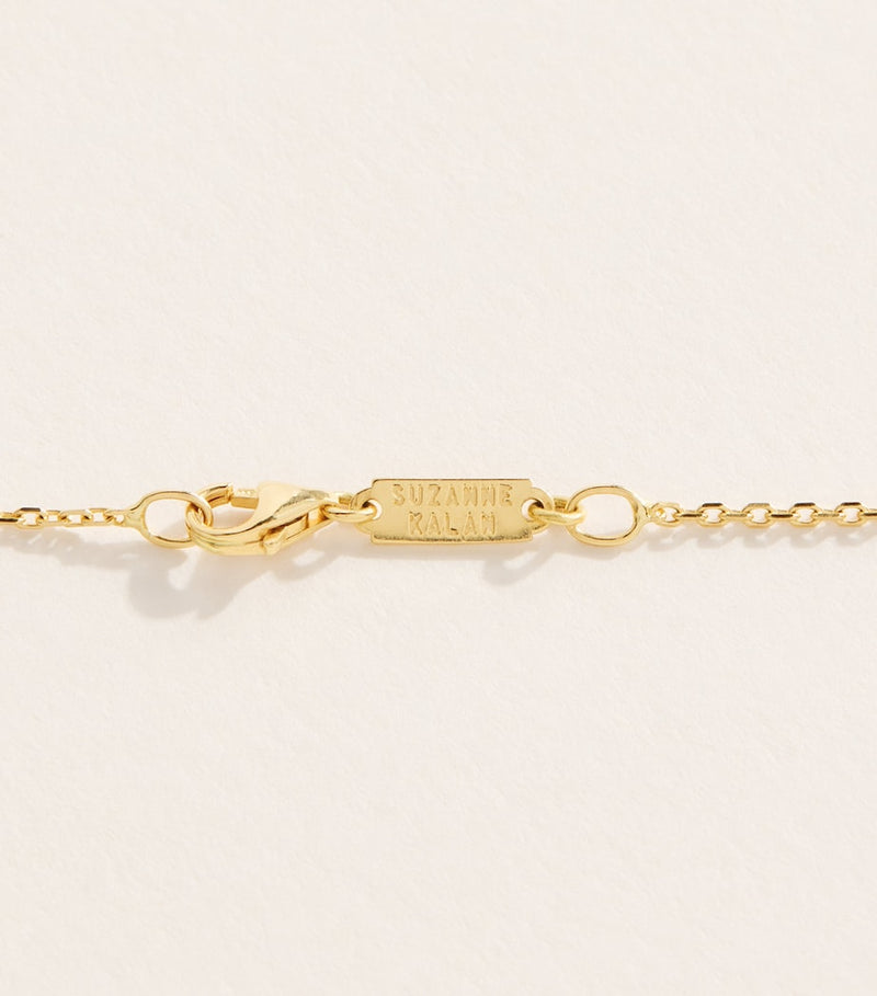 Suzanne Kalan yellow gold blue sapphire pendant necklace, imported from the UK