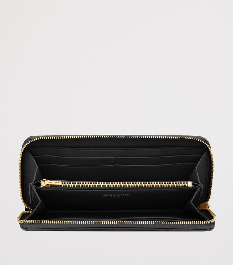 Saint Laurent Matelassé zip-up wallet with YSL monogram (British brand)