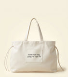 Prada large leather Bonnie top-handle bag, imported from the UK