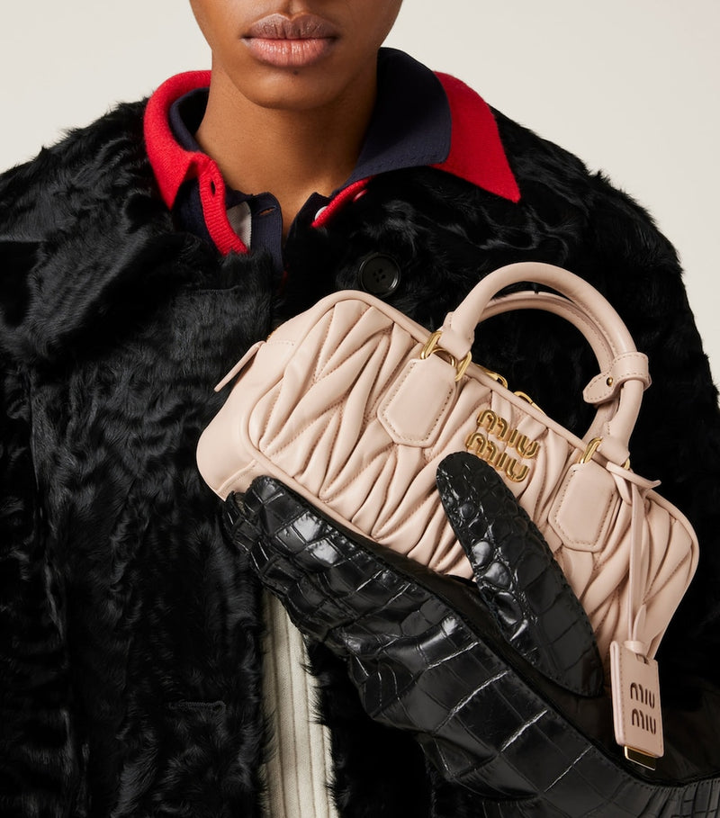 Miu Miu Arcadie matelassé leather top-handle bag, imported from the UK