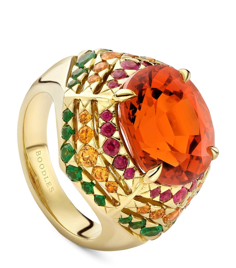 Boodles Masai Mara ring with garnet in yellow gold (British brand)