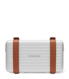 RIMOWA aluminium cross-body bag with leather strap (British brand)