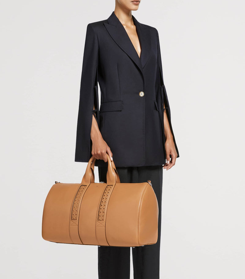 Aviteur leather woven-detail holdall - British product