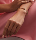 Boodles yellow gold diamond Roulette bangle, imported from the UK