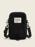 Balenciaga black faux fur crossbody pouch with logo, imported from the UK