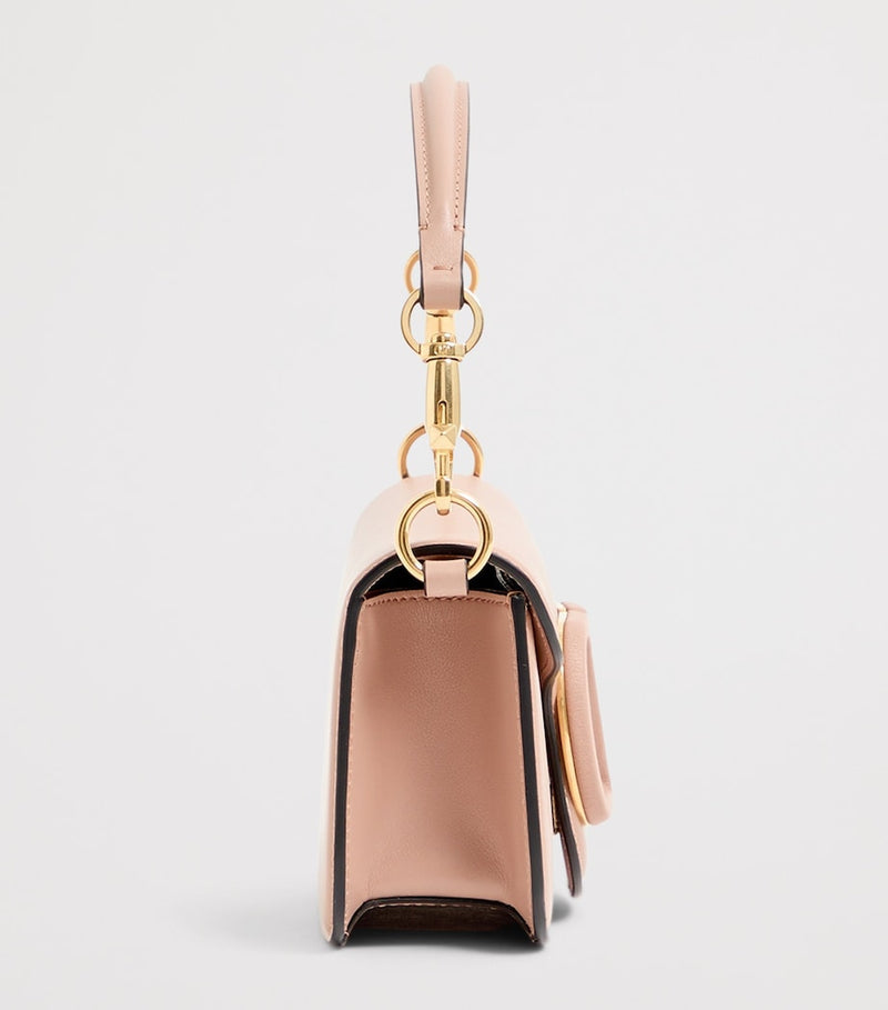 Valentino Garavani small Locò leather shoulder bag, imported from the UK