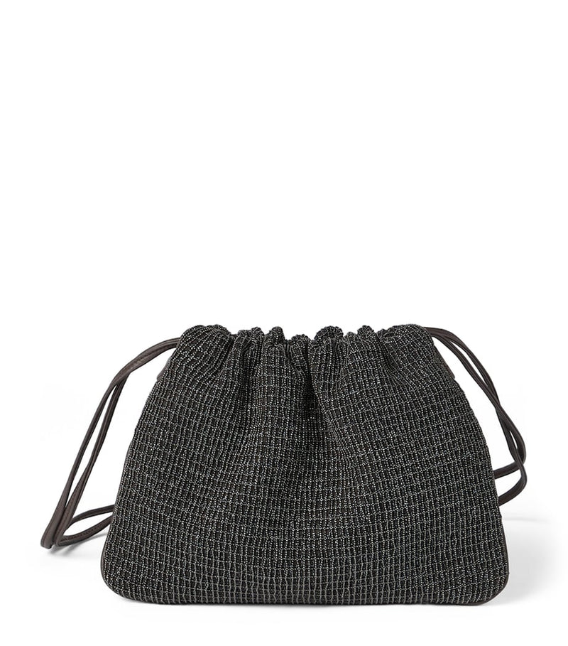 Brunello Cucinelli embellished drawstring cross-body bag, imported from the UK