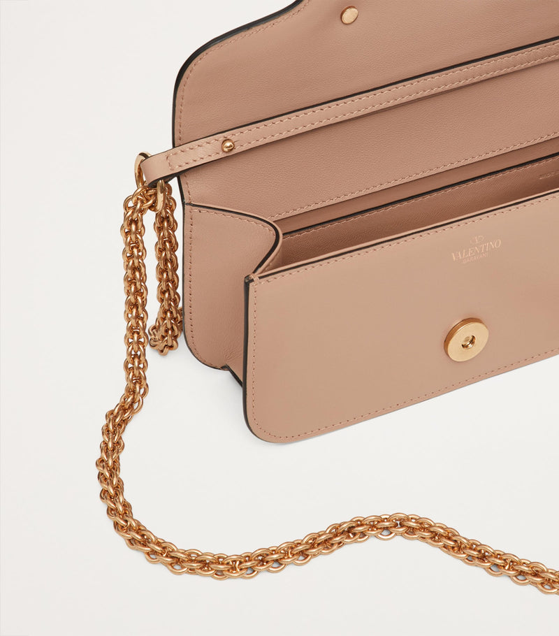 Valentino Garavani Small Leather Locò shoulder bag, imported from the UK