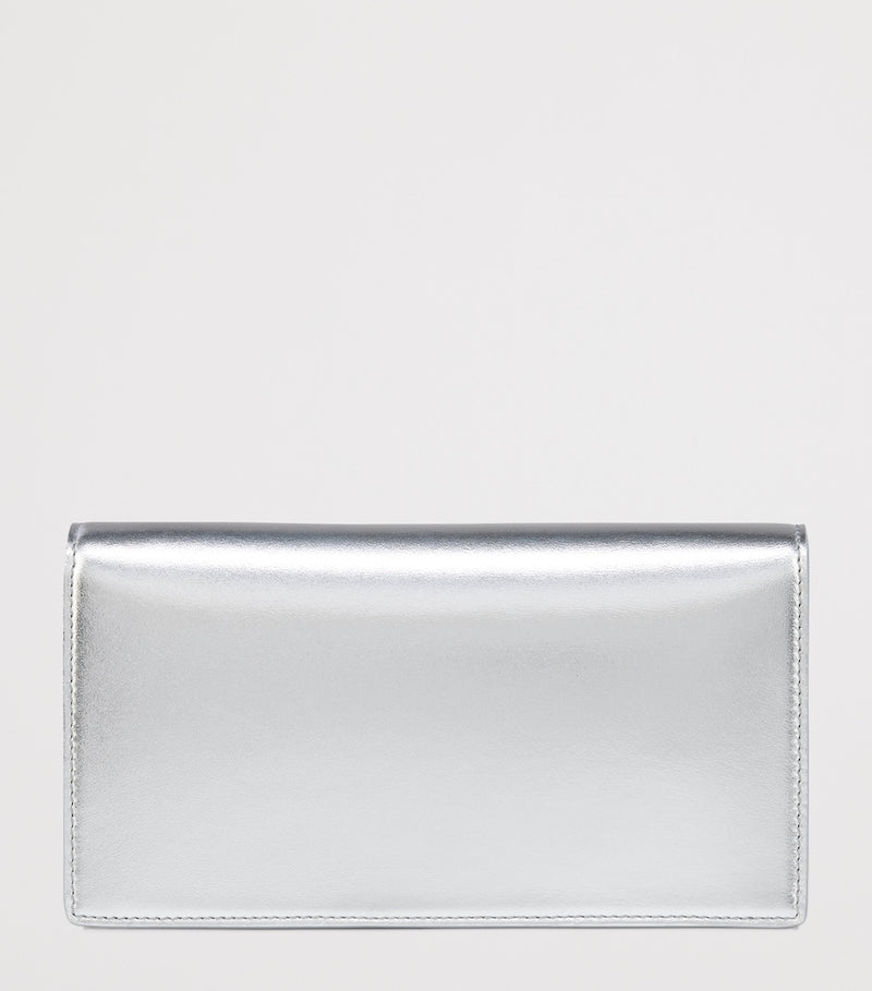 Christian Louboutin Bettina patent leather clutch bag (British brand)
