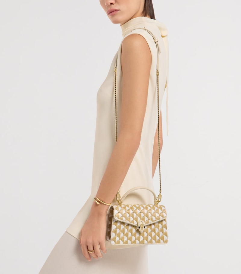 Bvlgari Serpenti Forever mini raffia handbag - British product