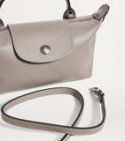 Longchamp Le Pliage Xtra extra-small leather pouch, imported from the UK