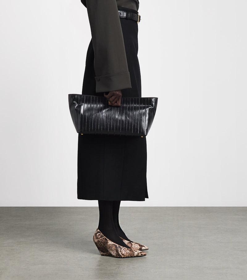 Camilla and Marc embossed leather poppy clutch bag (British brand)