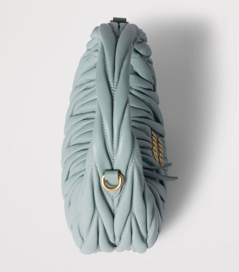 Miu Miu Wander matelassé leather top-handle bag (British brand)