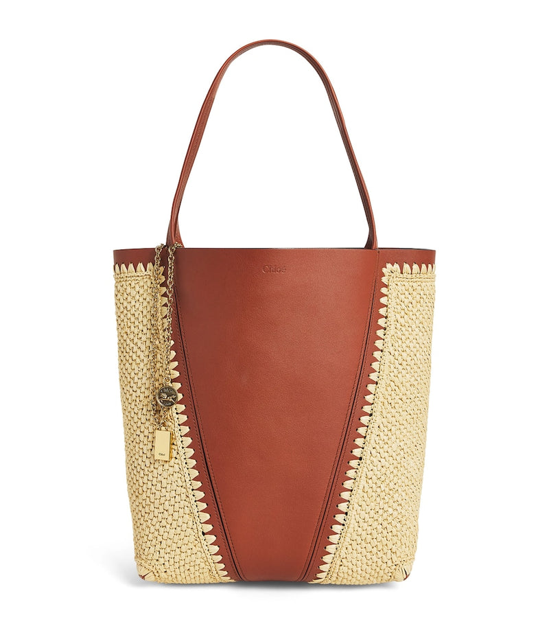 Chloé medium Spin tote bag in raffia and leather, imported from the UK