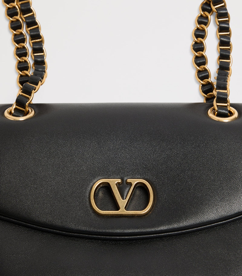 Valentino Garavani Djuna lambskin shoulder bag with gold VLOGO hardware, UK version