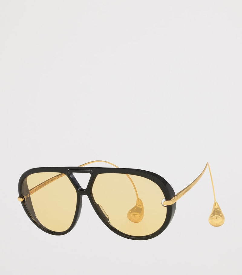 Bottega Veneta aviator sunglasses with drop-shaped temple tips, imported from the UK