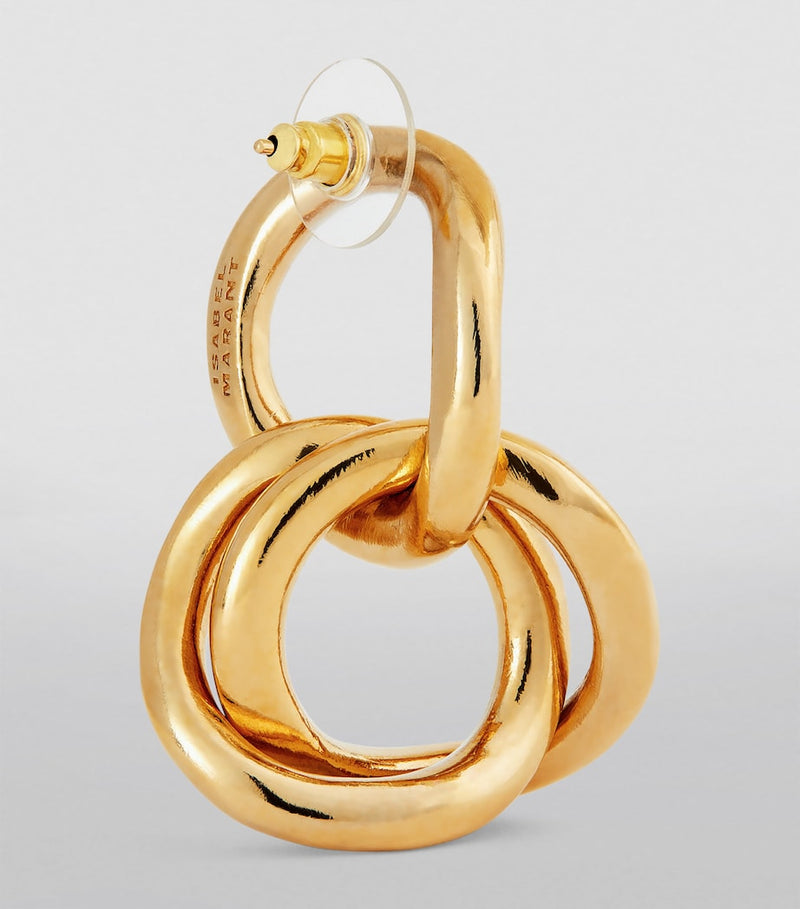 Isabel Marant multi-hoop earrings in polished brass, imported from the UK