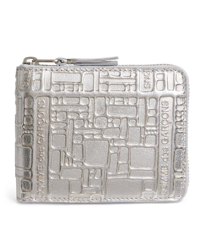Comme des Garçons wallet embossed logo zip, imported from the UK