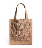 Chloé handwoven banana tote bag with gold charm, imported from the UK