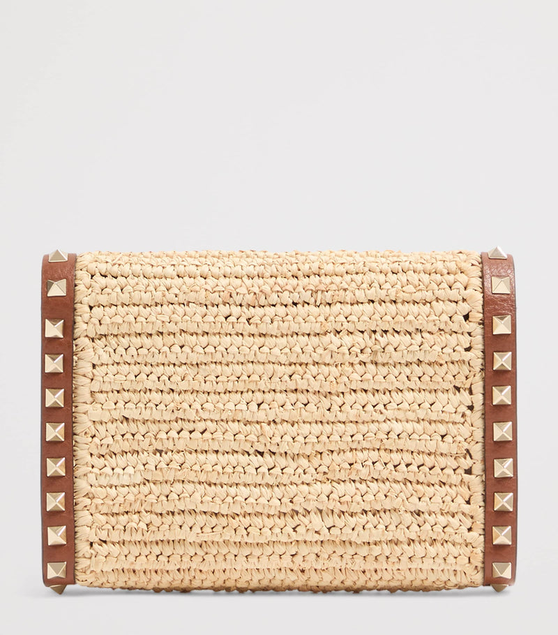 Valentino Garavani mini straw Rockstud cross-body bag - British product