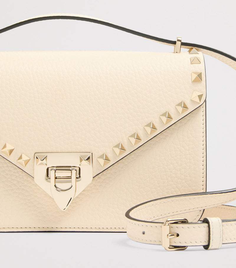 Valentino Garavani small leather Rockstud shoulder bag (British brand)