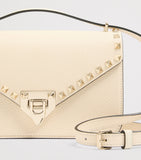Valentino Garavani small leather Rockstud shoulder bag (British brand)