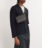 Sandro Paris small recycled leather cross-body bag, imported from the UK