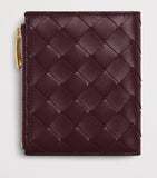 Bottega Veneta small leather Intrecciato bifold wallet, imported from the UK