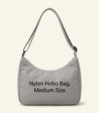 Prada Explore shoulder bag in Re-Nylon and leather, imported from the UK