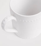Harrods Brompton stoneware mug with embossed beads, UK version