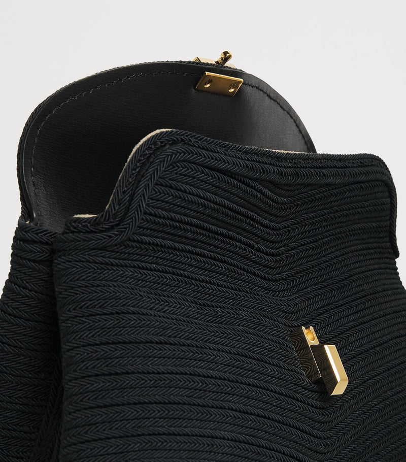 Toteme woven clutch bag mini - British product