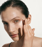 La Mer skincare set including moisturizing cream, lip treatment, and lip volumizer, UK version