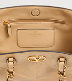 Valentino Garavani small lambskin Laseine tote bag, imported from the UK