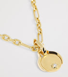 Jade Trau mini yellow gold diamond charm (British brand)