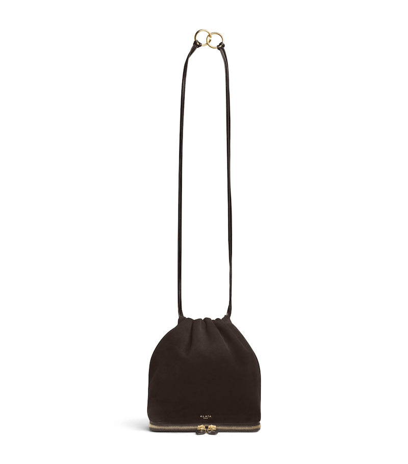 Alaïa Le Ponchon suede cross-body bag, imported from the UK