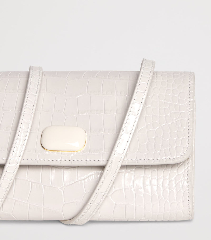 Jeffrey Levinson leather croc-embossed clutch bag, UK version