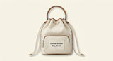 Prada Re-Nylon Duet bucket bag, sustainable luxury - British product