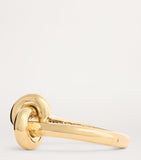 Engelbert yellow gold knot bangle with circular detailing - British product
