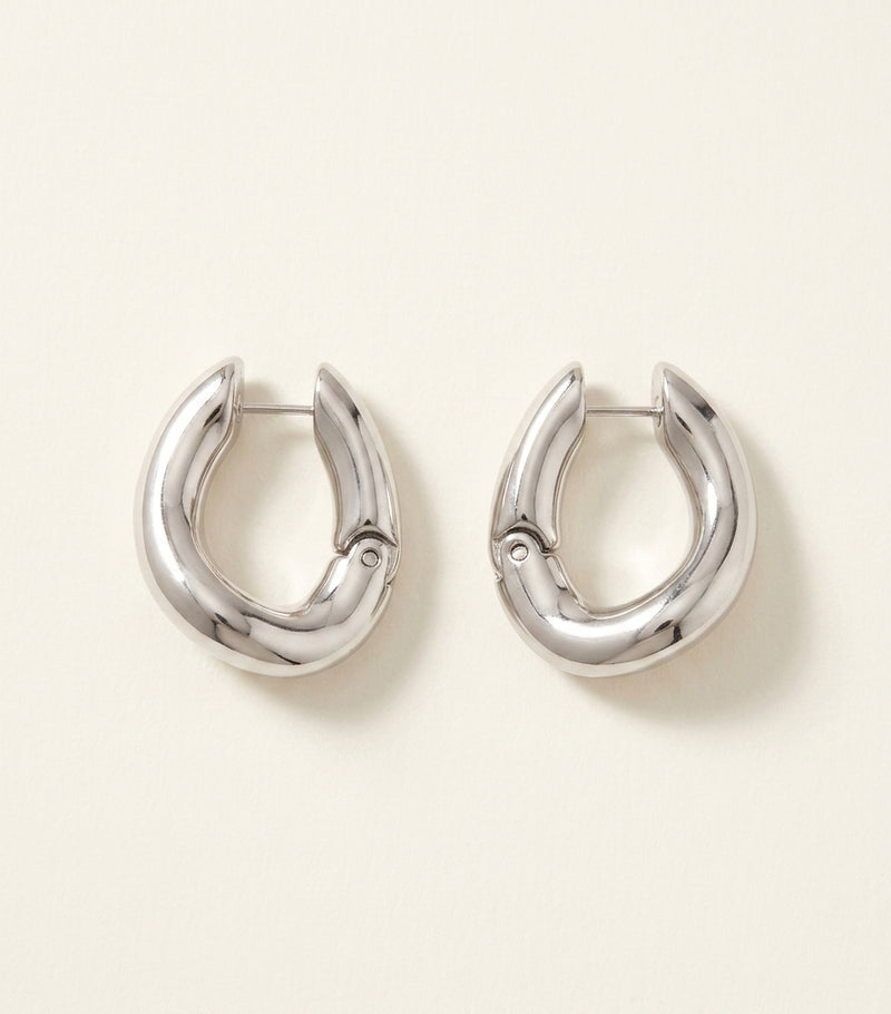 Balenciaga hoop earrings in polished copper, imported from the UK