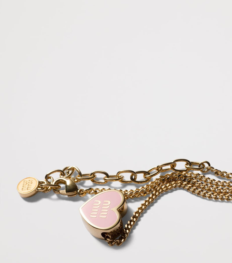 Miu Miu heart pendant necklace with enamel trim, imported from the UK