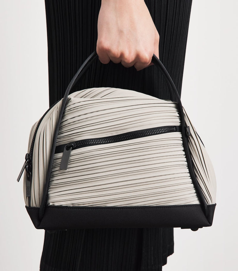 Issey Miyake Pleats Please bias pleats top-handle bag, imported from the UK